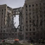 
              The regional government headquarters of Mykolaiv, Ukraine, following a Russian attack, on Tuesday, March 29, 2022. Ukrainian President Volodymyr Zelenskyy says seven people were killed in a missile strike on the regional government headquarters in the southern city of Mykolayiv. (AP Photo/Petros Giannakouris)
            