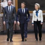 
              President of the European Council Charles Michel, left, French President Emmanuel Macron and European Commission President Ursula von der Leyen arrive for a press conference after the EU summit at the Chateau de Versailles, Friday, March 11, 2022 in Versailles, west of Paris. The European Union says it will continue applying pressure on Russia by devising a new set of sanctions to punish Moscow for its invasion of Ukraine while stepping up military support for Kyiv. (AP Photo/Michel Euler)
            