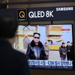 
              A man watches a TV screen showing a news program reporting about North Korea's missile, at a train station in Seoul, South Korea, Friday, March 11, 2022. North Korean leader Kim Jong Un ordered his officials to expand a satellite launch facility to fire a variety of rockets, state media reported Friday, as the U.S. and South Korean militaries concluded the North is testing a new intercontinental ballistic missile system. (AP Photo/Lee Jin-man)
            