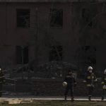 
              Firefighters walk in front of the damaged regional government headquarters of Mykolaiv, Ukraine, after a Russian attack, on Wednesday, March 30, 2022.At least 15 people were killed in a missile strike on the regional government headquarters on Tuesday, March 29 in the southern city of Mykolayiv. (AP Photo/Petros Giannakouris)
            