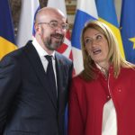 
              European Council President Charles Michel, left, speaks with European Parliament President Roberta Metsola during a round table meeting at an EU summit at the Chateau de Versailles, in Versailles, west of Paris, Thursday, March 10, 2022. European Union leaders on Thursday will focus on how to help Ukraine in its war with Russia, but the measures discussed are expected to stop short of fulfilling the country's hopes it can soon join the bloc. (AP Photo/Michel Euler)
            