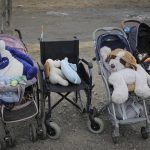 
              Baby strollers and a wheelchair lined up,  at the border crossing in Medyka, Poland, Friday, March 4, 2022. More than 1 million people have fled Ukraine following Russia's invasion in the swiftest refugee exodus in this century, the United Nations said Thursday. (AP Photo/Visar Kryeziu)
            