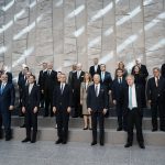 
              NATO heads of state pose for a group photo during an extraordinary NATO summit at NATO headquarters in Brussels, Thursday, March 24, 2022. As the war in Ukraine grinds into a second month, President Joe Biden and Western allies are gathering to chart a path to ramp up pressure on Russian President Vladimir Putin while tending to the economic and security fallout that's spreading across Europe and the world. (AP Photo/Thibault Camus)
            