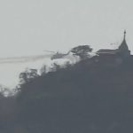 
              In this image taken from video provided by Free Burma Rangers, a Myanmar military helicopter fires rockets west of Loikaw in Kayah State, Myanmar on Feb. 21, 2022.  While Russia’s war in Ukraine dominates global attention, Myanmar’s military is targeting civilians in air and ground attacks on a scale unmatched in the country since World War II, according to a longtime relief worker who spent almost three months in a combat zone in the Southeast Asian nation. (Free Burma Rangers via AP)
            