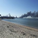 
              Smoke rises after shelling near a seaport in Berdyansk, Ukraine, Thursday, March 24, 2022. Ukraine's navy reported Thursday that it had sunk the Russian ship Orsk in the Sea of Asov near the port city of Berdyansk. It released photos and video of fire and thick smoke coming from the port area. Russia did not immediately comment on the claim. (AP Photo)
            