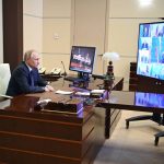 
              Russian President Vladimir Putin chairs a Security Council meeting via videoconference at the Novo-Ogaryovo residence outside Moscow, Russia, Thursday, March 3, 2022. (Andrei Gorshkov, Sputnik, Kremlin Pool Photo via AP)
            