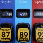 
              Gas prices appear on a pump at a gas station Monday, March 7, 2022, in Needham, Mass.  The average price for a gallon of gasoline in the U.S. hits a record $4.17 on Tuesday as the country prepares to ban Russian oil imports.  (AP Photo/Steven Senne)
            