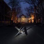 
              A barricade is placed on a street in front of the National Academic Theatre of Opera and Ballet building, in Odesa, Ukraine Thursday, March 24, 2022. The city of Odesa is prepared for a possible Russian offensive. (AP Photo/Petros Giannakouris)
            