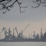 
              FILE - Harbor cranes are seen at the trade port in Mariupol, Ukraine, Wednesday, Feb. 23, 2022. Ukranian and Russian ports in the Black Sea are major hubs for wheat and corn, but traffic in and out has ground to a halt, effectively shutting down the world’s second-largest grain exporting region. (AP Photo/Sergei Grits, File)
            