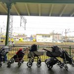 
              FILE - Strollers for refugees and their babies fleeing the conflict from neighbouring Ukraine are left at the train station in Przemysl, Poland, Wednesday, March 2, 2022. The United Nations says that more than 3.6 million people have fled Ukraine since the war started exactly one month ago Thursday in what is the biggest movement of people in Europe since World War II. Unprepared, most refugees believed they would soon be back home. That hope is waning now.  (AP Photo/Francesco Malavolta, FIle)
            