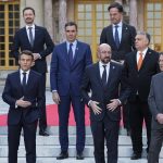 
              From left, Belgium's Prime Minister Alexander De Croo, French President Emmanuel Macron, Slovakia's Prime Minister Eduard Heger, Spain's Prime Minister Pedro Sanchez, European Council President Charles Michel, Dutch Prime Minister Mark Rutte, Hungary's Prime Minister Viktor Orban, Cypriot President Nicos Anastasiades and Estonia's Prime Minister Kaja Kallas pose during a group photo at an EU summit at the Chateau de Versailles, in Versailles, west of Paris, Thursday, March 10, 2022. (AP Photo/Michel Euler)
            
