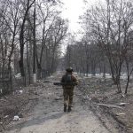 
              A Ukrainian serviceman walks near the position he was guarding in Mariupol, Ukraine, Saturday, March 12, 2022. Ukraine’s military says Russian forces have captured the eastern outskirts of the besieged city of Mariupol. In a Facebook update Saturday, the military said the capture of Mariupol and Severodonetsk in the east were a priority for Russian forces. Mariupol has been under siege for over a week, with no electricity, gas or water.(AP Photo/Evgeniy Maloletka)
            