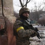 
              A Ukrainian serviceman guards his position in Mariupol, Ukraine, Saturday, March 12, 2022. Ukraine’s military says Russian forces have captured the eastern outskirts of the besieged city of Mariupol. In a Facebook update Saturday, the military said the capture of Mariupol and Severodonetsk in the east were a priority for Russian forces. Mariupol has been under siege for over a week, with no electricity, gas or water. (AP Photo/Evgeniy Maloletka)
            