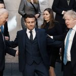 
              U.S. President Joe Biden, left, French President Emmanuel Macron, center, and British Prime Minister Boris Johnson speak prior to a group photo during an extraordinary NATO summit at NATO headquarters in Brussels, Thursday, March 24, 2022. As the war in Ukraine grinds into a second month, President Joe Biden and Western allies are gathering to chart a path to ramp up pressure on Russian President Vladimir Putin while tending to the economic and security fallout that's spreading across Europe and the world. (AP Photo/Thibault Camus)
            