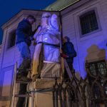 
              Ukrainians cover the sculptures of the Latin Cathedral in Lviv, western Ukraine, Thursday, March 3, 2022. Russia's invasion of Ukraine has forced more than a million people to flee their homeland in just a week. (AP Photo/Bernat Armangue)
            