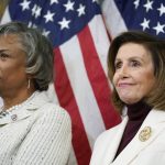 
              Speaker of the House Nancy Pelosi, of Calif., right, and Rep. Brenda Lawrence, D-Mich., listen during an Equal Pay Day event, Tuesday, March 15, 2022, on Capitol Hill in Washington. (AP Photo/Mariam Zuhaib)
            