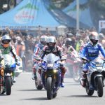 
              Italian riders Luca Marini, left, Andrea Dovizioso, center, Spain raider Alex Rins, right, take part in a parade in Jakarta, Indonesia, Wednesday, March 16, 2022. Indonesia will hold the Moto GP at Mandalika, Lombok Island on March 18-20. (AP Photo/Achmad Ibrahim)
            