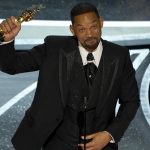 
              Will Smith accepts the award for best performance by an actor in a leading role for "King Richard" at the Oscars on Sunday, March 27, 2022, at the Dolby Theatre in Los Angeles. (AP Photo/Chris Pizzello)
            
