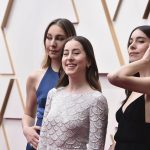 
              Este Haim, from left, Alana Haim, and Danielle Haim arrive at the Oscars on Sunday, March 27, 2022, at the Dolby Theatre in Los Angeles. (Photo by Jordan Strauss/Invision/AP)
            