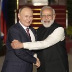
              FILE - Russian President Vladimir Putin, left, and Indian Prime Minister Narendra Modi greet each other before their meeting in New Delhi, India on Dec. 6, 2021. India is bracing for a disruption in Russian arms supplies following Moscow's invasion of Ukraine, and Prime Minister Narendra Modi's tightrope walk between Moscow and Washington could become more difficult due to a border standoff with China. (AP Photo/Manish Swarup, File)
            