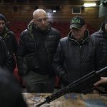 
              Ukrainian civilians receive weapons training inside a cinema in Lviv, western Ukraine, Saturday, March 5, 2022. (AP Photo/Felipe Dana)
            