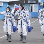 
              In this photo released by Roscosmos Space Agency, Russian cosmonauts, commander Оleg Аrtemyiv, centre, flight engineers Denis Мatveev, right, and Sergei Korsakov, members of the main crew to the International Space Station (ISS), walk prior to the launch at the Baikonur Cosmodrome, Kazakhstan, Friday, March 18, 2022. (Roscosmos Space Agency via AP)
            