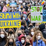 
              Participants of a demonstration called by the climate protection movement "Fridays for Future" protest in the capital with self-painted signs against the war and the Russian attack on Ukraine, Berlin, Germany, Thursday, March 3, 2022. (Hannibal Hanschke/dpa via AP)
            