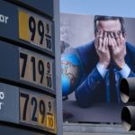 
              Gas prices are seen in front of a billboard advertising HBO's Last Week Tonight in Los Angeles, Monday, March 7, 2022. The average price for a gallon of gasoline in the U.S. hits a record $4.17 on Tuesday as the country prepares to ban Russian oil imports.  (AP Photo/Jae C. Hong)
            