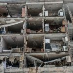 
              A view of destroyed apartments damaged by shelling, in Kharkiv, Ukraine, Sunday, March 13, 2022. (AP Photo/Andrew Marienko)
            