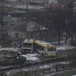 
              Russian's army tanks move down a street on the outskirts of Mariupol, Ukraine, Friday, March 11, 2022. (AP Photo/Evgeniy Maloletka)
            