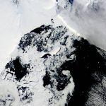 
              This satellite image provided by NASA, Aqua MODIS 21 on March 2022 shows the two pieces of C-38 (A and B icebergs) next to the main piece of C-37 at the top.  Scientists are concerned because an ice shelf the size of New York City collapsed in East Antarctica, an area that had long been thought to be stable. The collapse last week was the first time scientists have ever seen an ice shelf collapse in this cold area of Antarctica.(NASA via AP)
            