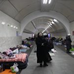 
              People gather in the Kyiv subway, using it as a bomb shelter in Kyiv, Ukraine, Wednesday, March 2, 2022. Russian forces have escalated their attacks on crowded cities in what Ukraine's leader called a blatant campaign of terror. (AP Photo/Efrem Lukatsky)
            