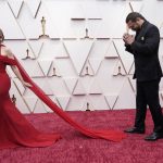
              Rosie Perez, left, and Jason Momoa arrive at the Oscars on Sunday, March 27, 2022, at the Dolby Theatre in Los Angeles. (AP Photo/Jae C. Hong)
            