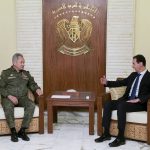 
              FILE - In this image from video provided by the Russian Defense Ministry Press Service on Feb. 15, 2022, Russian Russian Defense Minister Sergei Shoigu, left, listens to Syrian President Bashar Assad during their talks in Damascus, Syria. (Russian Defense Ministry Press Service via AP, File)
            