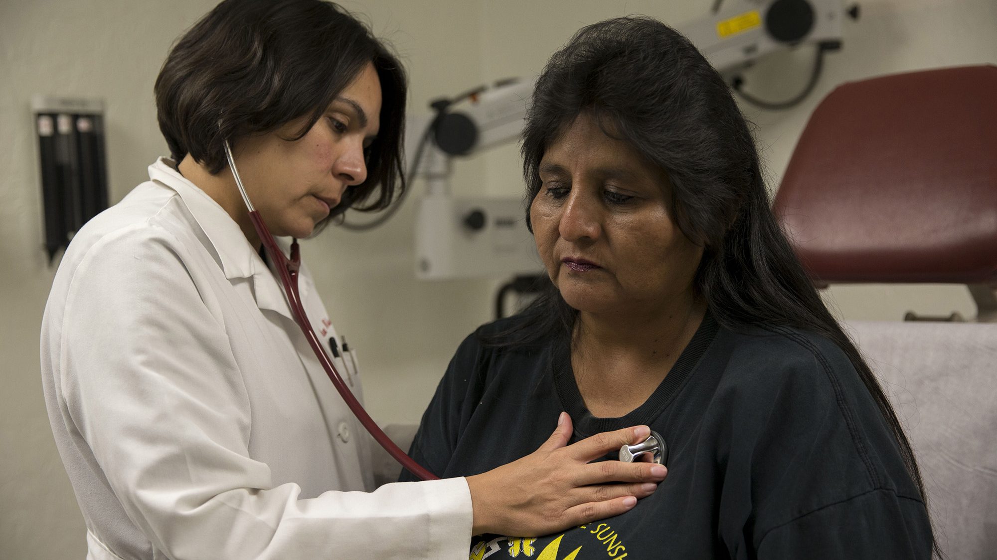 Dr. Dena Wilson examines patient Doris Miguel at Indian Health Service in Phoenix in this 2017 phot...