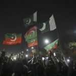 
              Supporters of former Prime Minister Imran Khan chant slogans during a protest after a no-confidence vote, in Islamabad, Pakistan, Sunday, April 10, 2022. Pakistan’s political opposition toppled Khan in a no-confidence vote in Parliament early Sunday after several political allies and a key party in his ruling coalition deserted him. (AP Photo/Rahmat Gul)
            