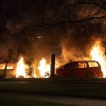 
              Cars are engulfed by flames after protests broke out at Rosengard in Malmo, Sweden, late Sunday, April 17, 2022.  The riots broke out following Danish far-right politician Rasmus Paludan’s meetings and planned Quran burnings in various Swedish cities and towns since Thursday. (Johan Nilsson/TT via AP)
            