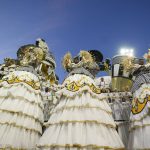 
              Dancers from the Academicos do Tatuape samba school perform on a float during a carnival parade in Sao Paulo, Brazil, Saturday, April 23, 2022. (AP Photo/Andre Penner)
            
