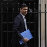 
              FILE - Rishi Sunak, Britain's Chancellor of the Exchequer poses for the media as he leaves 11 Downing Street in London, Wednesday, March 23, 2022. Sunak has defended his wife’s decision to take advantage of rules that allow many foreigners to escape U.K. taxes on their overseas income, saying critics have launched a smear campaign against her to get at him. (AP Photo/Alastair Grant, File)
            