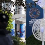 
              IMF police officers stand outside of the International Monetary Fund (IMF) building, during the first day of the World Bank/IMF Spring meetings in Washington, Tuesday, April 19, 2022. (AP Photo/Jose Luis Magana)
            