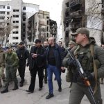 
              In this image provided by the European Council, European Council President Charles Michel, center, as he is given a tour of the region of Borodyanka, Ukraine, Wednesday, April 20, 2022. (Dario Pignatelli/European Council via AP)
            