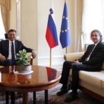 
              Robert Golob, right, the leader of the Freedom Movement party meets with President Borut Pahor, left, in Ljubljana, Slovenia, Tuesday, April 26, 2022. The winner of last weekend's parliamentary election in Slovenia said after the meeting that he hopes to have a new government formed by mid-June. (AP Photo)
            