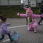 
              Performer Ben Dusing, from Fort Mitchell, Kentucky, US, wears an Easter rabbit costume as he prepares to embrace Lilia at the Medyka border crossing in Poland on Sunday, April 17, 2022. (AP Photo/Rodrigo Abd)
            
