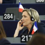 
              FILE - French far-right leader Marine le Pen listens during the vote session for the presidency of the European Parliament in Strasbourg, eastern France, Tuesday, Jan. 17, 2017. Paris prosecutors are studying a report by the EU fraud agency accusing French far-right presidential candidate Marine Le Pen and other members of her nationalist party of misusing public funds while serving in the European Parliament. (AP Photo/Jean-Francois Badias, File)
            