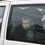 
              A boy looks out of a bus during an evacuation of civilians in Kramatorsk, Ukraine, Saturday, April 30, 2022. (AP Photo/Andriy Andriyenko)
            