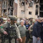 
              U.N. Secretary-General Antonio Guterres, center, checks buildings destroyed by Russian shelling in Irpin, on the outskirts of Kyiv, Ukraine, Thursday, April 28, 2022. (AP Photo/Efrem Lukatsky)
            