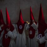 
              Penitents from 'Real Cofradia del Santisimo Cristo de las Injurias' also known as 'El Silencio' brotherhood gather prior a procession in Zamora, Spain, Wednesday, April 13, 2022. (AP Photo/Bernat Armangue)
            