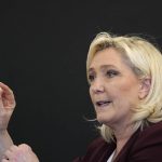 
              French far-right leader Marine Le Pen gestures during a press conference Tuesday, April 12, 2022 in Vernon, west of Paris. The thought of an extreme-right leader standing at the helm of the European Union would be abhorrent to most in the 27-nation bloc. But if Emmanuel Macron falters in the April 24 French presidential elections, it might be two weeks away. (AP Photo/Francois Mori)
            