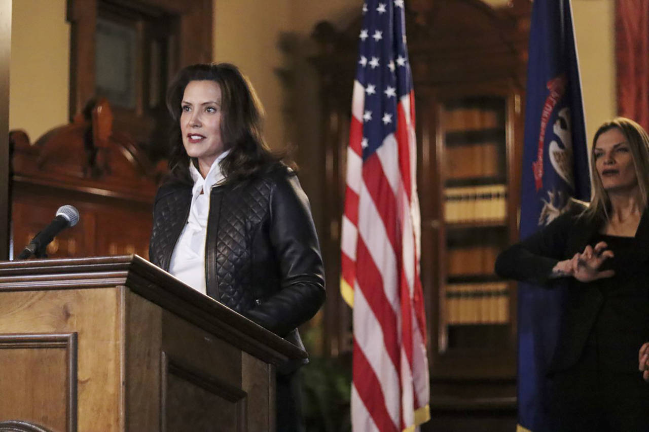 FILE - Michigan Office of the Governor, Michigan Gov. Gretchen Whitmer addresses the state during a...