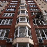 
              A view of an apartment building damaged by shelling in Irpin, in the outskirts of Kyiv, Ukraine, Monday, April 11, 2022. (AP Photo/Evgeniy Maloletka)
            